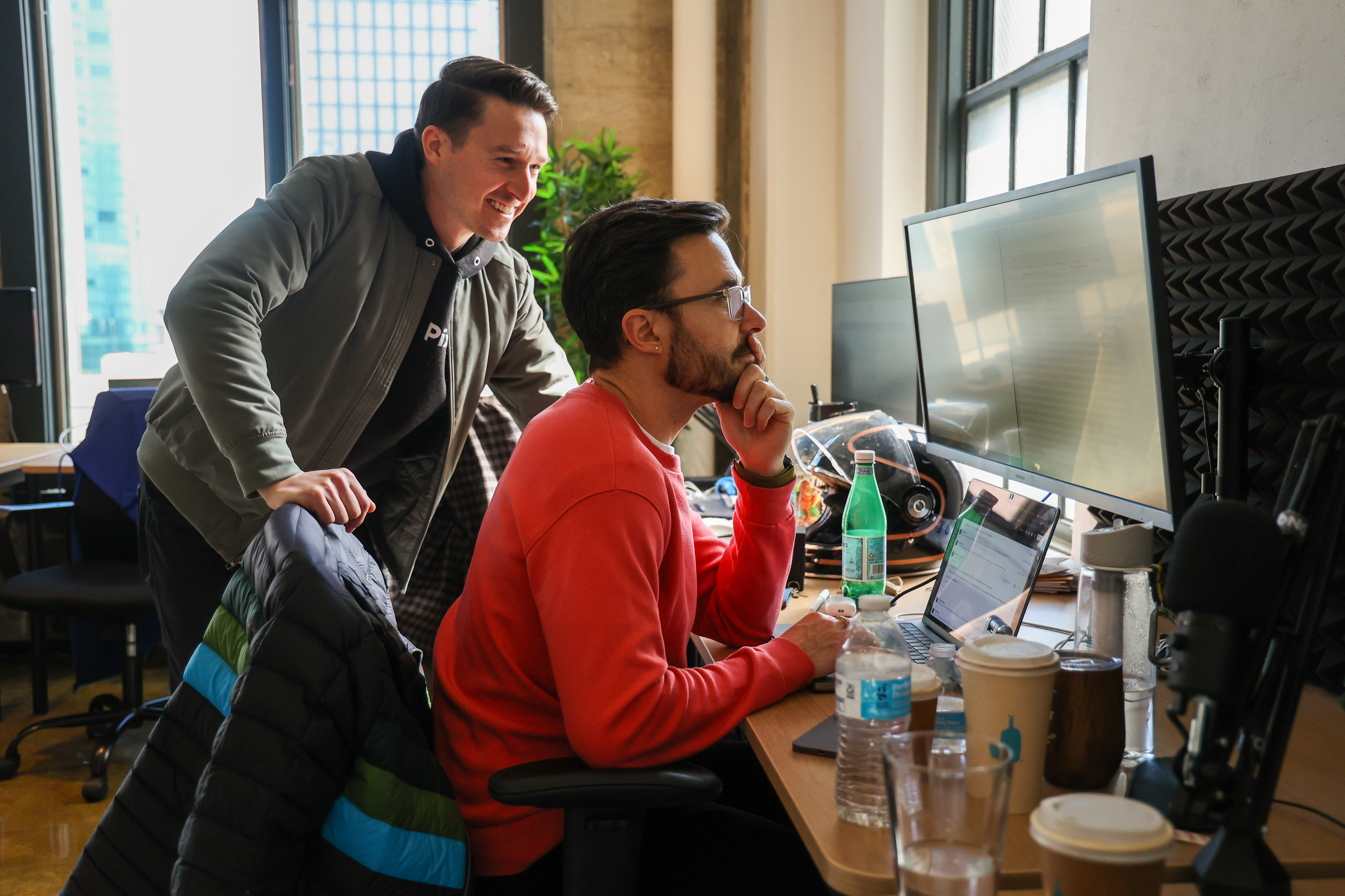 Race Johnson helping a client set up AI agents over lunch in San Francisco